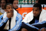 LOS ANGELES, CA - APRIL 27:  (L-R) C.J. Miles #34 and Paul Millsap #24 of the Utah Jazz sit on the bench in the second quarter against the Los Angeles Lakers in Game Five of the Western Conference Quarterfinals during the 2009 NBA Playoffs at Staples Center on April 27, 2009 in Los Angeles, California. NOTE TO USER: User expressly acknowledges and agrees that, by downloading and or using this photograph, User is consenting to the terms and conditions of the Getty Images License Agreement.  (Photo by Kevork Djansezian/Getty Images)