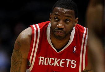 MILWAUKEE - FEBRUARY 09: Tracy McGrady #1 of the Houston Rockets watches as a teammate shoots a free-throw against the Milwaukee Bucks on February 9, 2009 at the Bradley Center in Milwaukee, Wisconsin. The Bucks defeated the Rockets 124-112. NOTE TO USER: User expressly acknowledges and agreees that, by downloading and/or using this Photograph, User is consenting to the terms and conditions of the Getty Images License Agreement. (Photo by Jonathan Daniel/Getty Images)