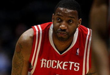 MILWAUKEE - FEBRUARY 09: Tracy McGrady #1 of the Houston Rockets watches as a teammate shoots a free-throw against the Milwaukee Bucks on February 9, 2009 at the Bradley Center in Milwaukee, Wisconsin. The Bucks defeated the Rockets 124-112. NOTE TO USER: User expressly acknowledges and agreees that, by downloading and/or using this Photograph, User is consenting to the terms and conditions of the Getty Images License Agreement. (Photo by Jonathan Daniel/Getty Images)