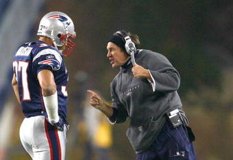 FOXBORO, MA - OCTOBER 20: Bill Belichick chats with Rodney Harrison #37 of the New England Patriots against the Denver Broncos at Gillette Stadium on October 20, 2008 in Foxboro, Massachusetts. The Paytiots won 41-7. (Photo by Jim Rogash/Getty Images)