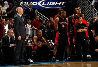 NEW ORLEANS - FEBRUARY 06:  Head coach Jay Triano of the Toronto Raptors watches the final minutes of the game agaainst the New Orleans Hornets on February 6, 2009 in New Orleans, Louisiana.  NOTE TO USER: User expressly acknowledges and agrees that, by downloading and/or using this Photograph, user is consenting to the terms and conditions of the Getty Images License Agreement.  (Photo by Chris Graythen/Getty Images)
