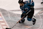 SAN JOSE, CA - APRIL 25:  Jonathan Cheechoo #14 of the San Jose Sharks controls the puck against the Anaheim Ducks during Game Five of the Western Conference Quarterfinal Round of the 2009 NHL Stanley Cup Playoffs at HP Pavilion on April 25, 2009 in San Jose, California. The Sharks won 3-2 in overtime.  (Photo by Stephen Dunn/Getty Images)