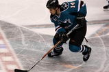 SAN JOSE, CA - APRIL 25:  Jonathan Cheechoo #14 of the San Jose Sharks controls the puck against the Anaheim Ducks during Game Five of the Western Conference Quarterfinal Round of the 2009 NHL Stanley Cup Playoffs at HP Pavilion on April 25, 2009 in San Jose, California. The Sharks won 3-2 in overtime.  (Photo by Stephen Dunn/Getty Images)