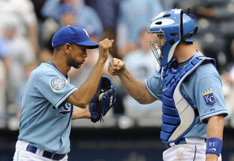 KANSAS CITY, MO - APRIL 30:  Juan Cruz #37 and John Buck #14 of the Kansas City Royals celebrate following a 8-6 win over the Toronto Blue Jays on April 30, 2009 at Kauffman Stadium in Kansas City, Missouri. (Photo by G. Newman Lowrance/Getty Images)