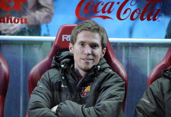 MADRID, SPAIN - MARCH 01: Aleksander Hleb of Barcelona smiles from the subs bench before the La Liga match between Atletico Madrid and Barcelona at the Vicente Calderon stadium on March 1, 2009 in Madrid, Spain.  (Photo by Denis Doyle/Getty Images)