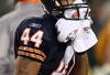 CHICAGO - DECEMBER 22: Kevin Payne #44 of the Chicago Bears tries to keep his face warm during a time-out against the Green Bay Packers on December 22, 2008 at Soldier Field in Chicago, Illinois. (Photo by Jonathan Daniel/Getty Images)