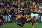 BRISBANE, AUSTRALIA - JULY 17:   Referee Tony De Las Heras (L) is seen falling to the ground and is knocked unconcious after colliding with Tonie Carroll of the Broncos and Jamie Simpson of the Rabbitohs during the round 19 NRL match between the South Sydney Rabbitohs and the Brisbane Broncos at Suncorp Stadium on July 17, 2009 in Brisbane, Australia.  (Photo by Bradley Kanaris/Getty Images)