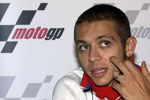 LONDON - JULY 8:  Valentino Rossi of Italy, World Moto GP Champion, takes questions from the media during a press conference aboard the 'Elizabethan' July 8, 2003 on the River Thames in London. Rossi will compete in the British round of the World Moto GP Championship July 13, 2003 at Donington Park.  (Photo by Dan Regan/Getty Images)