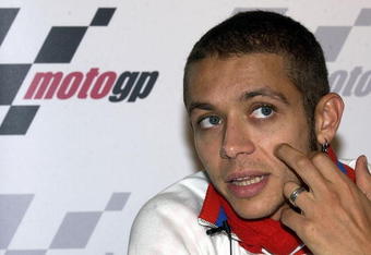 LONDON - JULY 8:  Valentino Rossi of Italy, World Moto GP Champion, takes questions from the media during a press conference aboard the 'Elizabethan' July 8, 2003 on the River Thames in London. Rossi will compete in the British round of the World Moto GP Championship July 13, 2003 at Donington Park.  (Photo by Dan Regan/Getty Images)