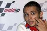 LONDON - JULY 8:  Valentino Rossi of Italy, World Moto GP Champion, takes questions from the media during a press conference aboard the 'Elizabethan' July 8, 2003 on the River Thames in London. Rossi will compete in the British round of the World Moto GP Championship July 13, 2003 at Donington Park.  (Photo by Dan Regan/Getty Images)