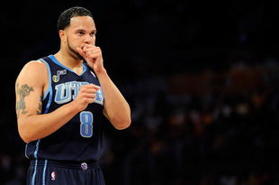 LOS ANGELES, CA - APRIL 21:  Deron Williams #8 of the Utah Jazz looks on against the Los Angeles Lakers in Game Two of the Western Conference Quarterfinals during the 2009 NBA Playoffs at Staples Center on April 21, 2009 in Los Angeles, California. NOTE TO USER: User expressly acknowledges and agrees that, by downloading and or using this photograph, User is consenting to the terms and conditions of the Getty Images License Agreement.  (Photo by Kevork Djansezian/Getty Images)
