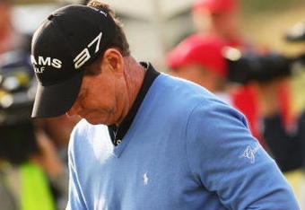 TURNBERRY, SCOTLAND - JULY 19:  Tom Watson of USA reacts after hitting out of the rough on the third play off hole following the final round of the 138th Open Championship on the Ailsa Course, Turnberry Golf Club on July 19, 2009 in Turnberry, Scotland.  (Photo by Andrew Redington/Getty Images)