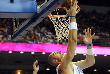ORLANDO, FL - JUNE 14:  Marcin Gortat #13 of the Orlando Magic goes up for a shot against Jordan Farmar #5 of the Los Angeles Lakers  in the second half of Game Five of the 2009 NBA Finals on June 14, 2009 at Amway Arena in Orlando, Florida.  NOTE TO USER:  User expressly acknowledges and agrees that, by downloading and or using this photograph, User is consenting to the terms and conditions of the Getty Images License Agreement.  (Photo by Ronald Martinez/Getty Images)