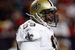ATLANTA - DECEMBER 10:  Hollis Thomas #99 of the New Orleans Saints yells out during the game against the Atlanta Falcons on December 10, 2007 at the Georgia Dome in Atlanta, Georgia. The Saints defeated the Falcons 34-14.  (Photo by Chris Graythen/Getty Images)