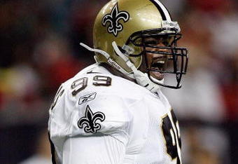 ATLANTA - DECEMBER 10:  Hollis Thomas #99 of the New Orleans Saints yells out during the game against the Atlanta Falcons on December 10, 2007 at the Georgia Dome in Atlanta, Georgia. The Saints defeated the Falcons 34-14.  (Photo by Chris Graythen/Getty Images)