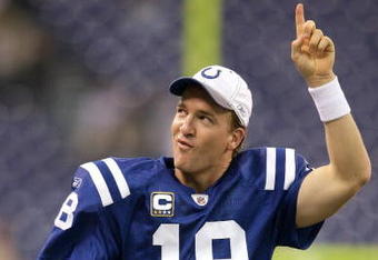 INDIANAPOLIS - DECEMBER 07:  Peyton Manning #18 of the Indianapolis Colts celebrates as he runs off the field after their 35-3 win against the Cincinnati Bengals at Lucas Oil Stadium on December 7, 2008 in Indianapolis, Indiana.  (Photo by Andy Lyons/Getty Images)