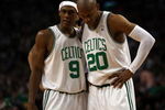 BOSTON - MAY 17:  Rajon Rondo #9 and Ray Allen #20 of the Boston Celtics talk as the Orlando Magic shoot a free throw in Game Seven of the Eastern Conference Semifinals during the 2009 NBA Playoffs at TD Banknorth Garden on May 17, 2009 in Boston, Massachusetts. The Orlando Magic defeated the Boston Celtics 101-82 to advance to the Eastern Conference Finals. NOTE TO USER: User expressly acknowledges and agrees that, by downloading and or using this photograph, User is consenting to the terms and conditions of the Getty Images License Agreement.  (Photo by Elsa/Getty Images)