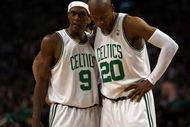 BOSTON - MAY 17:  Rajon Rondo #9 and Ray Allen #20 of the Boston Celtics talk as the Orlando Magic shoot a free throw in Game Seven of the Eastern Conference Semifinals during the 2009 NBA Playoffs at TD Banknorth Garden on May 17, 2009 in Boston, Massachusetts. The Orlando Magic defeated the Boston Celtics 101-82 to advance to the Eastern Conference Finals. NOTE TO USER: User expressly acknowledges and agrees that, by downloading and or using this photograph, User is consenting to the terms and conditions of the Getty Images License Agreement.  (Photo by Elsa/Getty Images)