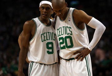 BOSTON - MAY 17:  Rajon Rondo #9 and Ray Allen #20 of the Boston Celtics talk as the Orlando Magic shoot a free throw in Game Seven of the Eastern Conference Semifinals during the 2009 NBA Playoffs at TD Banknorth Garden on May 17, 2009 in Boston, Massachusetts. The Orlando Magic defeated the Boston Celtics 101-82 to advance to the Eastern Conference Finals. NOTE TO USER: User expressly acknowledges and agrees that, by downloading and or using this photograph, User is consenting to the terms and conditions of the Getty Images License Agreement.  (Photo by Elsa/Getty Images)