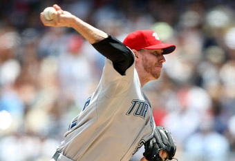 NEW YORK - JULY 04:  Roy Halladay #32 of the Toronto Blue Jays pitches against the New York Yankees on July 4, 2009 at Yankee Stadium in the Bronx borough of New York City.  (Photo by Nick Laham/Getty Images)