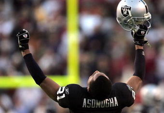 WASHINGTON - NOVEMBER 20:  Oakland Raiders cornerback Nnamdi Asomugha #21 celebrates after the Raiders recovered a game winning fumble in the fourth quarter on November 20, 2005 at Fed Ex Field in Landover, Maryland.  (Photo by Win McNamee/Getty Images)