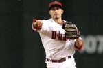 PHOENIX - JULY 10:  Infielder Felipe Lopez #2 of the Arizona Diamondbacks fields a ground ball out against the Florida Marlins during the major league baseball game at Chase Field on July 10, 2009 in Phoenix, Arizona. The Diamondbacks defeated the Marlins 8-0.  (Photo by Christian Petersen/Getty Images)