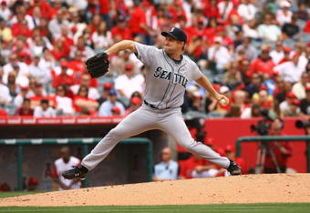 ANAHEIM, CA - MAY 31:  Garrett Olson #49 of the Seattle Mariners pitches against the Los Angeles Angels of Anaheim at Angel Stadium on May 31, 2009 in Anaheim, California.  (Photo by Jeff Gross/Getty Images)