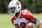 TEMPE, AZ - MAY 2 :  Chris Wells #26 of the Arizona Cardinals runs during a team minicamp at the team training facility on May 2, 2009 in Tempe, Arizona.  (Photo by Jonathan Willey/Getty Images)