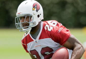 TEMPE, AZ - MAY 2 :  Chris Wells #26 of the Arizona Cardinals runs during a team minicamp at the team training facility on May 2, 2009 in Tempe, Arizona.  (Photo by Jonathan Willey/Getty Images)