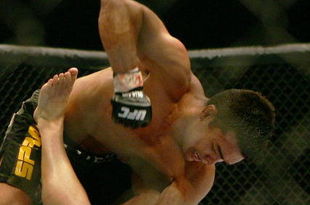 MANCHESTER, UNITED KINGDOM - APRIL 21: Lyoto Machida of Brazil and David Heath of England in action during a Welterweight bout of the Ultimate Fighting Championship at the Manchester Evening News Arena on April 21, 2007 in Manchester, England. (Photo by Gary M. Prior/Getty Images).