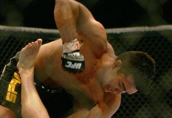 MANCHESTER, UNITED KINGDOM - APRIL 21: Lyoto Machida of Brazil and David Heath of England in action during a Welterweight bout of the Ultimate Fighting Championship at the Manchester Evening News Arena on April 21, 2007 in Manchester, England. (Photo by Gary M. Prior/Getty Images).