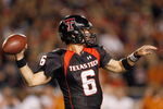 LUBBOCK, TEXAS - NOVEMBER 1:  Quarterback Graham Harrell #6 of the Texas Tech Red Raiders looks to pass the ball down the field during the game against the Texas Longhorns on November 1, 2008 at Jones Stadium in Lubbock, Texas. (Photo by: Jamie Squire/Getty Images)