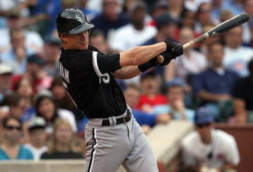 CHICAGO - JUNE 18:  Gordon Beckham #15 of the Chicago White Sox bats against the Chicago Cubs during the game on June 18, 2009 at Wrigley Field in Chicago, Illinois. (Photo by Jonathan Daniel/Getty Images)