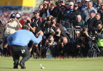 TURNBERRY, SCOTLAND - JULY 19:  Tom Watson of USA lines up a putt in a playoff watched by photographers following the final round of the 138th Open Championship on the Ailsa Course, Turnberry Golf Club on July 19, 2009 in Turnberry, Scotland.  (Photo by David Cannon/Getty Images)