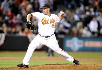 BALTIMORE - APRIL 8:  George Sherrill #52 of the Baltimore Orioles pitches against the New York Yankees at Camden Yards April 8, 2009 in Baltimore, Maryland.  (Photo by Greg Fiume/Getty Images)