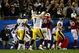 TAMPA, FL - FEBRUARY 01:  Ben Roethlisberger #7 of the Pittsburgh Steelers celebrates after he threw a 6-yard touchdown pass to Santonio Holmes #10 in the fourth quarter against the Arizona Cardinals during Super Bowl XLIII on February 1, 2009 at Raymond James Stadium in Tampa, Florida. Steelers won 27-23. (Photo by Al Bello/Getty Images)