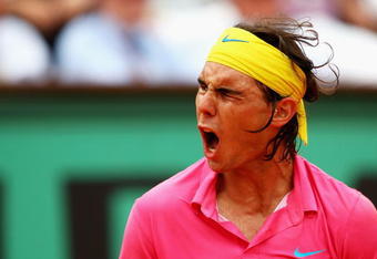 PARIS - MAY 31:  A dejected Rafael Nadal of Spain reacts as he heads towards defeat during the Men's Singles Fourth Round match against Robin Soderling of Sweden on day eight of the French Open at Roland Garros on May 31, 2009 in Paris, France.  (Photo by Clive Brunskill/Getty Images)