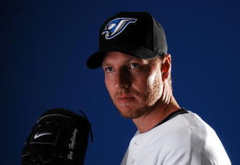 DUNEDIN, FL - FEBRUARY 22:  Pitcher Roy Halladay #32 of the Toronto Blue Jays poses for a photo on media day during spring training at the Bobboy Mattix Traing Center February 22, 2008 in Dunedin, Florida.  (Photo by Marc Serota/Getty Images)