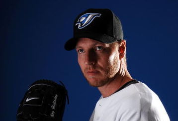 DUNEDIN, FL - FEBRUARY 22:  Pitcher Roy Halladay #32 of the Toronto Blue Jays poses for a photo on media day during spring training at the Bobboy Mattix Traing Center February 22, 2008 in Dunedin, Florida.  (Photo by Marc Serota/Getty Images)
