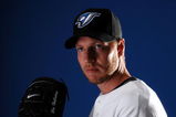 DUNEDIN, FL - FEBRUARY 22:  Pitcher Roy Halladay #32 of the Toronto Blue Jays poses for a photo on media day during spring training at the Bobboy Mattix Traing Center February 22, 2008 in Dunedin, Florida.  (Photo by Marc Serota/Getty Images)