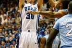 DURHAM, NC - FEBRUARY 11:  Jon Scheyer #30 of the Duke Blue Devils shoots a jump shot against the North Carolina Tar Heels during the game on February 11, 2009 at Cameron Indoor Stadium in Durham, North Carolina.  (Photo by Kevin C. Cox/Getty Images)