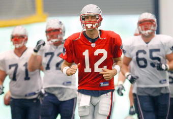 FOXBORO, MA - JULY 24:  Tom Brady #12 of the New England Patriots participates in a drill during the first day of training camp at Gillette Stadium on July 24, 2008 in Foxboro, Massachusetts.  (Photo by Jim Rogash/Getty Images)
