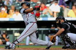 DENVER - JULY 09:  Yunel Escobar #19 of the Atlanta Braves takes an at bat against the Colorado Rockies during MLB action at Coors Field on July 9, 2009 in Denver, Colorado. The Rockies defeated the Braves 7-6.  (Photo by Doug Pensinger/Getty Images)