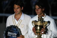 LONDON - JULY 06:  Rafael Nadal of Spain and Roger Federer of Switzerland pose for pictures with after Nadal won in five sets in the final on day thirteen of the Wimbledon Lawn Tennis Championships at the All England Lawn Tennis and Croquet Club on July 6, 2008 in London, England.  (Photo by Julian Finney/Getty Images)