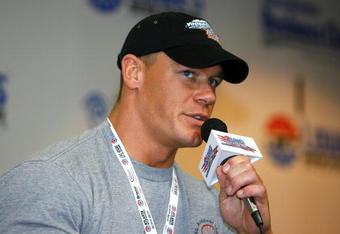CONCORD, NC - MAY 27:  Professional wrestler John Cena, speaks to members of the media during a press conference, prior to the NASCAR Nextel Cup Series Coca-Cola 600 on May 27, 2007 at Lowe's Motor Speedway in Concord, North Carolina.  Cena was there to talk about taking part in the TV show ?Fast Cars and Super Stars: Gillette Young Guns Celebrity Race.?  (Photo by Rusty Jarrett/Getty Images for NASCAR)