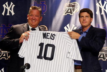 NEW YORK - JULY 20:  Notre Dame head coach Charlie Weiss and New York Yankees Managing General Partner Hal Steinbrenner pose for a photograph during a press conference announcing that Yankee Stadium will play host to the 2010 Notre Dame v Army college football game on July 20, 2009 at Yankee Stadium in the Bronx borough of New York City. The game is to be played on November 20, 2010.  (Photo by Jim McIsaac/Getty Images)
