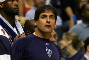 DALLAS - JUNE 20:  Owner Mark Cuban of the Dallas Mavericks looks on standing in the team bench in game six of the 2006 NBA Finals against the Miami Heat on June 20, 2006 at American Airlines Center in Dallas, Texas.  The Heat defeated the Mavericks 95-92 to win the NBA title. NOTE TO USER: User expressly acknowledges and agrees that, by downloading and or using this photograph, User is consenting to the terms and conditions of the Getty Images License Agreement.  (Photo by Stephen Dunn/Getty Images)