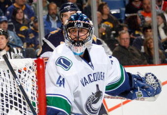 BUFFALO - OCTOBER 17:  Goalie Curtis Sanford #41 of the Vancouver Canucks blocks the net during the game against the Buffalo Sabres on October 17, 2008 at HSBC Arena in Buffalo, New York. (Photo by: Rick Stewart/Getty Images)