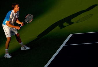 INDIANAPOLIS - JULY 20:  Sam Querrey plays Arnaud Clement of France during the Indianapolis Tennis Championships on July 20, 2009 at the Indianapolis Tennis Center in United States, Indiana.  (Photo by Matthew Stockman/Getty Images)