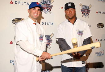 NEW YORK - APRIL 03:  David Wright of the New York Mets and Derek Jeter of the New York Yankees attend Delta's Jeter/Wright batting challenge at the Stone Rose Lounge on April 3, 2009 in New York City.  (Photo by Stephen Lovekin/Getty Images)
